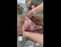 Woman shows how to cook lima bean rice and lamb