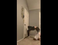 Girl doing backbend hits knee on door 