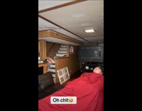 Lady Throws Clothes Basket on Afloat Man