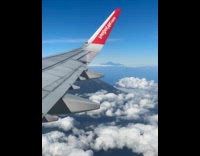 Submitter shows mountain view from airplane window