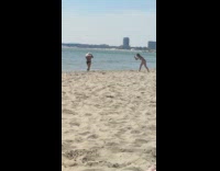 Woman white hair black bikini on beach