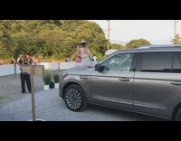 Influencer girl on silver suv pictures