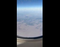 Woman shows strange rectangular shape on desert