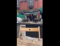 Collab IITW - Man dances shows body front of restaurant Part 1