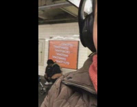 Guy taking poop squat in the open subway