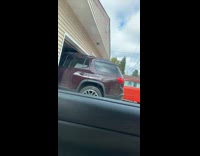 Girls making fun of their grandpa after he reverses out of garage 