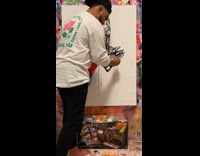 Time lapse video of an acrylic and spray paint art of black panther