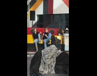 Man woman black turtle neck sit dance