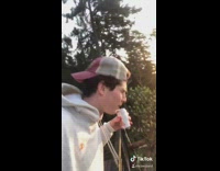 Guy spits out la croix drink sunset 