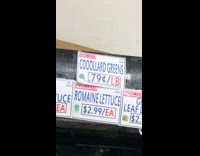 Misspelled produce sign collard greens grocery store