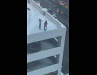 Woman pink jacket pose on parking garage rooftop