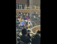 Open baseball jersey guy sings at game 