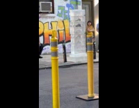 Shoes inside stacked large ice on sidewalk