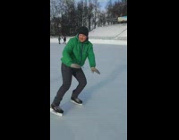 Guy ice skating backwards runs into kid 