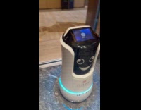 Robot rides and leaves the building elevator 