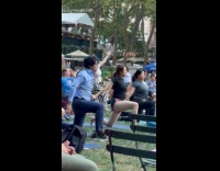 Man wear work clothes at park yoga