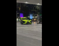 Men gets their picture taken on a slingshot 