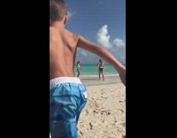 Two girls beach water little boy