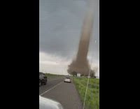 Tornado moving across road 