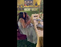 Three women in a dress dances to the music