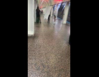 Ladies in Costume Take Pictures at Subway