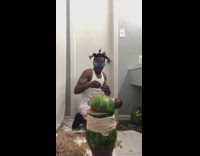 Watermelon explodes from being wrapped  around rope 