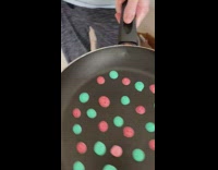 Rainbow mini pancakes powdered sugar