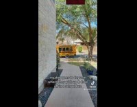 Yellow school bus in front of house drops off golden retriever picked up