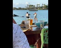 Woman crop top stand on bay ledge