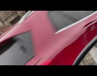 Guy uses yellow bottles to exercise arms