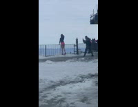 Lady in Bikini Underwear Poses for Picture