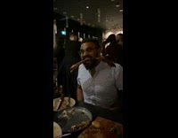 Foodie poses with bone between teeth