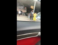 Guy with multiple yellow doll boxes 
