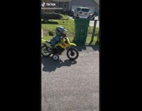 Mom dragged by toddler riding motor scooter