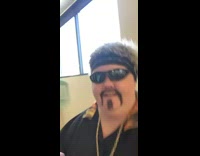 Woman dresses up in Guy Fieri costume 