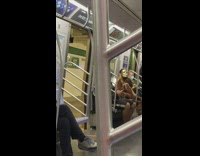 Man in Mask and Costume Looks Away