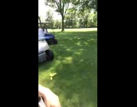 Guy dressed as mario golf cart throws banana