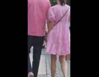 Man walks with his pet emu in the city