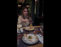 Woman squishing friends cake as revenge