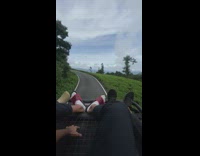 Guy and girl on car roof