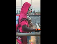 Man clown mask flex chest muscles to music