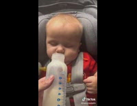 Lady Makes Asleep Baby Smell her Breast Milk