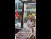 Woman obnoxiously singing adele poorly to annoy strangers