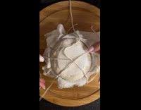 Woman shows process of Cherry Blossom Sourdough