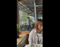 Guy exercises in outdoor dining area 