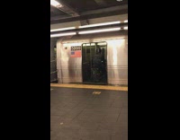 Guy on motorcycle enters subway black helmet 