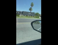 Woman in white skirt tiktok dance at the grass