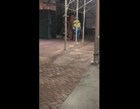 Minion dinosaur and shark inflatable costumes sidewalk 