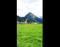 Guy does tricks while paragliding 