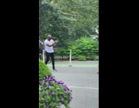 Spiderman and green goblin pose for photos